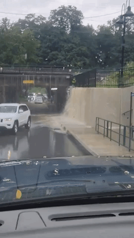 Wall of Water Forms at Exton Train Station During Weather Warnings in Pennsylvania
