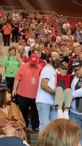 'Lots of Teamwork Here': Men Carry WWII Veteran to His Seat at Phoenix Trump Rally