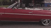 soldierkidd driving flip off red car soldier kidd GIF