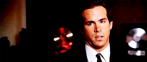 Movie gif. Ryan Reynolds rolls his eyes and cranes his head back in annoyance.