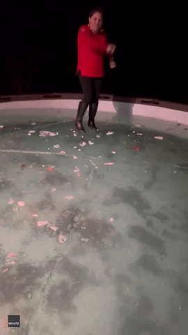 Frozen Pool Breaks Beneath Dancing Family on Christmas Day