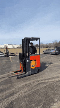boomandbucket circle stunt forklift parking lot GIF