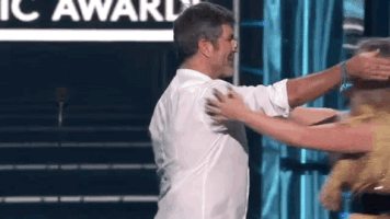 simon cowell hug GIF by Billboard Music Awards