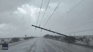 Power Poles Brought Down During Monsoon Near Phoenix