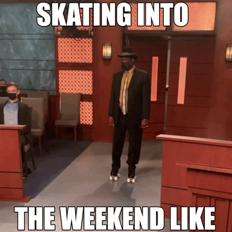 TV gif. A man in a dark suit, a yellow shirt, a face mask, and a fedora enters the Judge Jerry courtroom on roller skates. He does a casual 360 spin, then loses his balance a bit. He regains it, loses it, and regains it again. Text, "Skating into the weekend like."