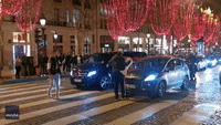 Police Disperse Supporters Celebrating on Champs-Elysees After Dramatic Arab Cup Victory