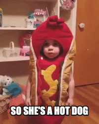 Little Girl Dons Hot Dog Costume
