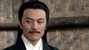 he he sneer GIF