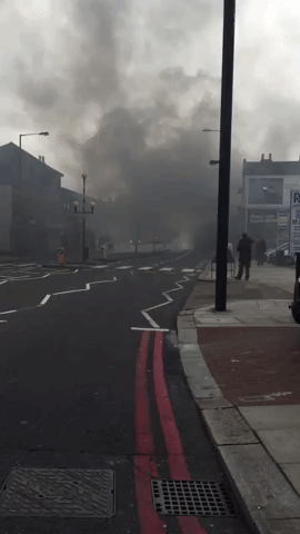 Bus Fire Closes Road in London's Norbury
