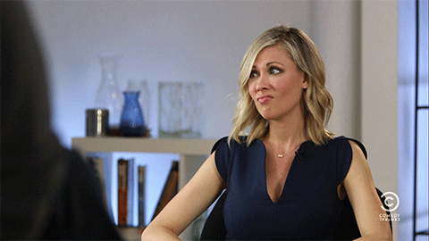 TV gif. Desi Lydic as a Daily Show correspondent sitting in an interview, with pursed lips and raised eyebrows as her eyes shift side to side in shock.