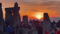 Crowd Gathers for Solstice Sunrise at Stonehenge