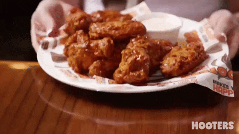 Hungry Chicken Wings GIF by Hooters