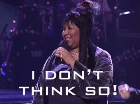 Celebrity gif. Aretha Franklin onstage with a band, smiling as she shakes her head and says, "I don't think so!" which appears as text.