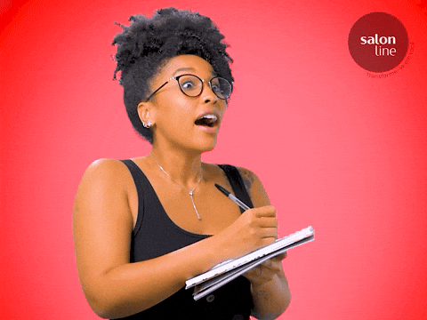 Nerdy student taking notes