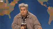 SNL gif. Bobby Moynihan as the Drunk Uncle on Weekend Update sneers and blows raspberries.