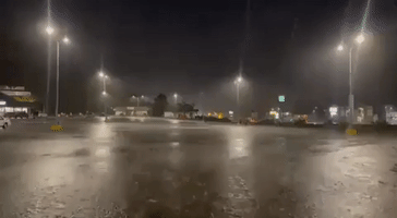 Strong Winds Drive Rain Across Parking Lot During Thunderstorm in La Vale, Maryland