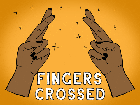 Illustrated gif. Two floating hands cross their fingers tightly as sparkles shimmer around the hands. Text, “Fingers crossed.”