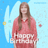 Sponsored gif. Woman pops up into view, tosses confetti in the air, and then says happy birthday. Text also reads, “Happy birthday!”