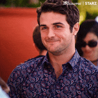 TV gif. Beau Mirchoff as Ford in Now Apocalypse nods and smiles earnestly.