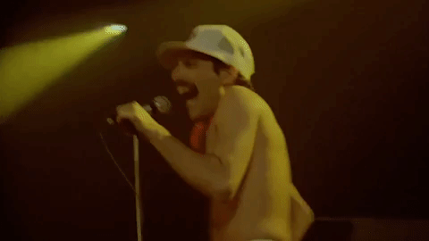 freddie mercury singing GIF