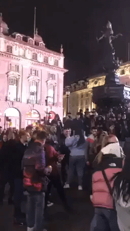 Crowds Gather at London's Piccadilly Circus after 10pm Pub Closure