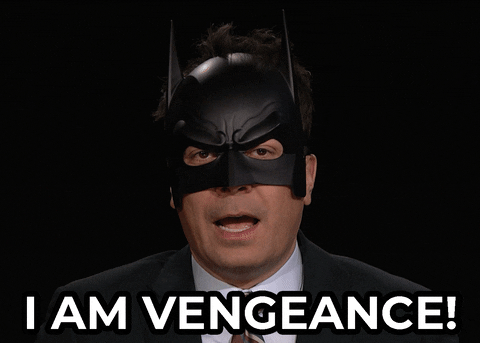 Tonight Show gif. Jimmy Fallon wears a plastic batman mask and says with a frown, "I am vengeance!"