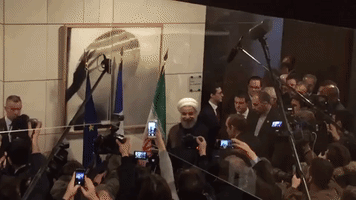 Iran's President Drums Up Business at Paris Trade Forum