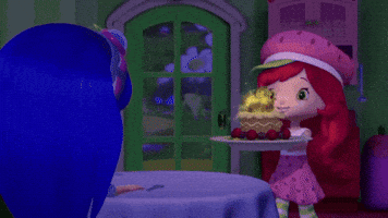 Cartoon gif. Strawberry Shortcake carrying a birthday cake with fresh berries and sparkling candles, sets it on a table.