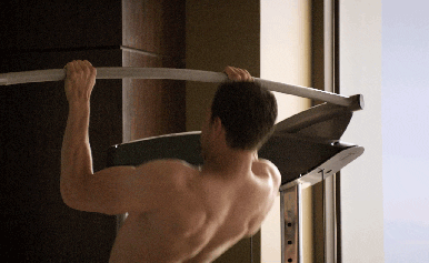 jamie dornan muscles GIF by Fifty Shades
