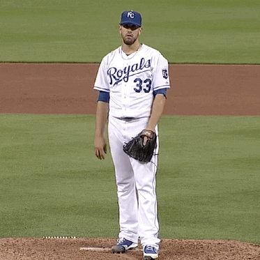 Sports gif. Kansas City Royals pitcher James Shields slightly tosses his hands up and looks around in confusion, appearing mildly annoyed on the mound.