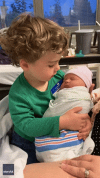 Little Boy Wonders Why Swaddled Newborn Sister 'Doesn't Have Any Arms'