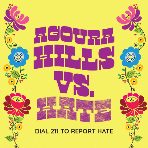 Text gif. Groovy purple text ripples on a yellow background framed by 60s flower power folk art. Text, "Agoura Hills vs hate, Dial 211 to report hate."