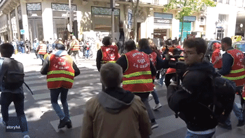 Pension Reform Demonstrators Clash With Police in Paris in Department Stores
