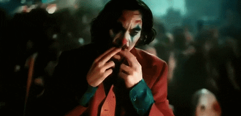 rosu-gutmandaniel giphyupload smile joker GIF