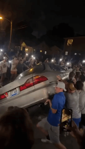 Kentucky Fans Flip Car, Light Fire in Lexington