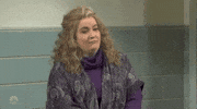 SNL gif. Aidy Bryant stares off, thinking with a shocked expression on her face. She blinks and then says, Oh,” and frowns as if impressed.