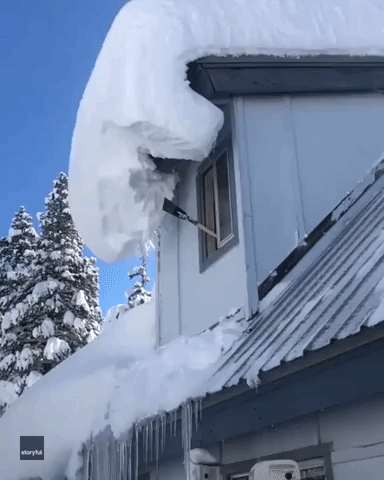 Truckee Resident Smashes Rooftop Snow Shelf Into Smithereens