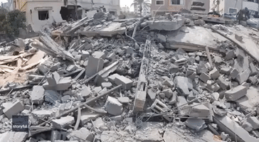 Palestinians Survey Damage Following Israeli Airstrikes on Gaza