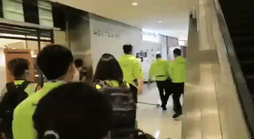 Plainclothes Police Officer Pepper-Sprays Crowd in Hong Kong Mall Scuffle With Activist