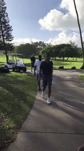 Obama Gives Sweet Baby a Kiss at Hawaii Golf Course