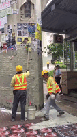 Workers Paint Over Hong Kong Lennon Wall After Weekend Violence