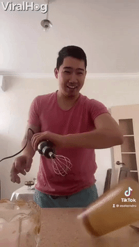 Guy Using Mixer Sends Glass into Perpetual Motion