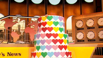 Drew popping out of a cake