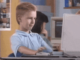Meme gif. Brent Rambo happily surfs the web, his screen reading, "Find your polling place, i-will-vote-dot-com," prompting him to turn to us, giving his thumbs up and nod of approval.