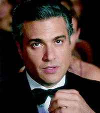 TV gif. Jaime Camil sits in an enthusiastic audience and rolls his eyes while sighing, clenching his fists together.