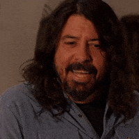 Celebrity gif. Dave Grohl shakes his head and nods, saying, "Yeah, it's so good. It's killer."