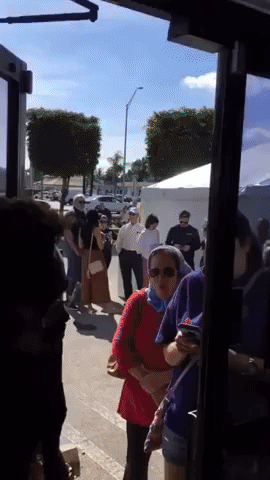Miami Shoppers Wait in Long Line for Last Minute Thanksgiving Ham