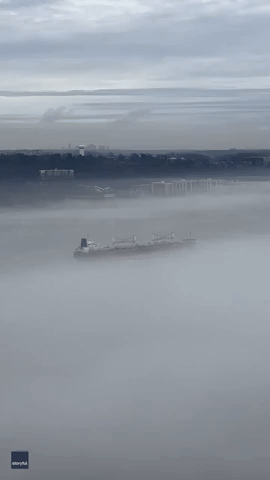Ship Appears to Sail on Clouds as Fog Blankets Hudson River
