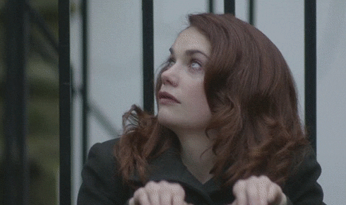 TV gif. Ruth Wilson as Alice in Luther stares as she makes a sexual gesture with her hands, making a hole with her finger and thumb, then pumping her index finger in and out.