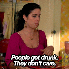 TV gif. Ana Ortiz as Hilda in Ugly Betty flippantly waves her hand, shaking her head and saying, "People get drunk, They don't care."